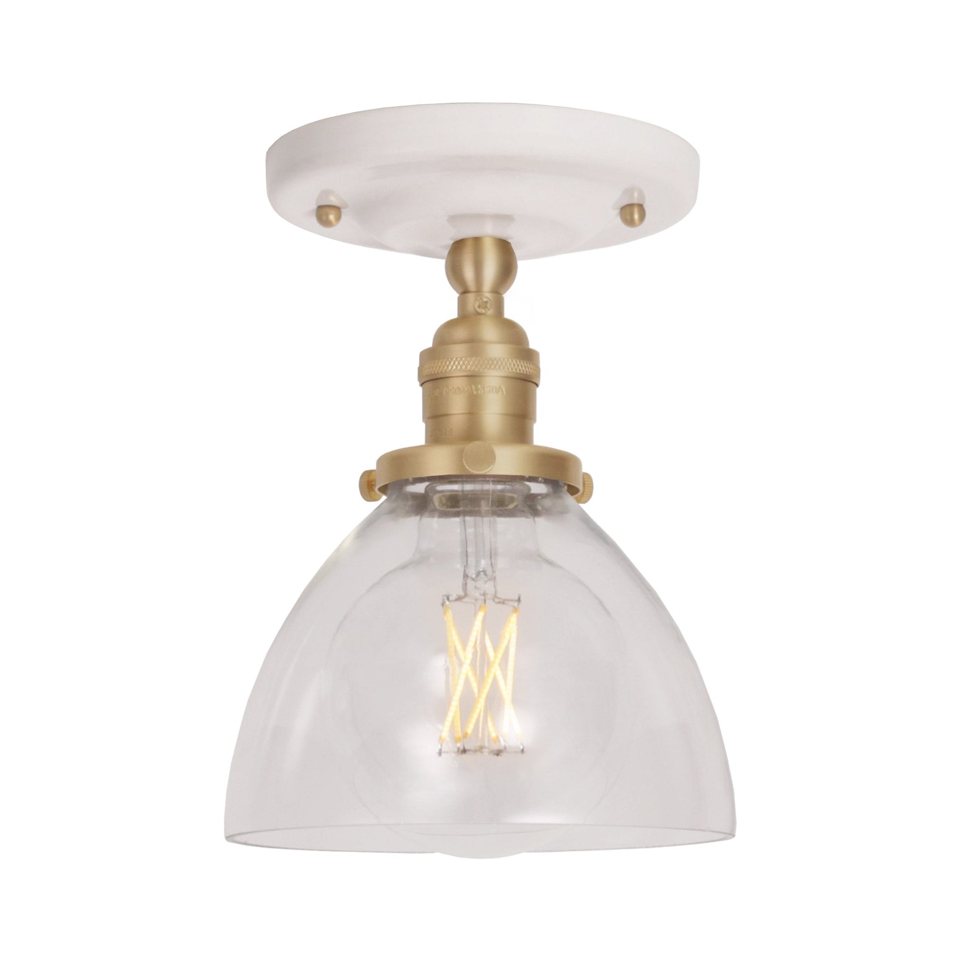 Grace Surface shown in Brass with a Gloss White Ceramic canopy and Clear Glass shade