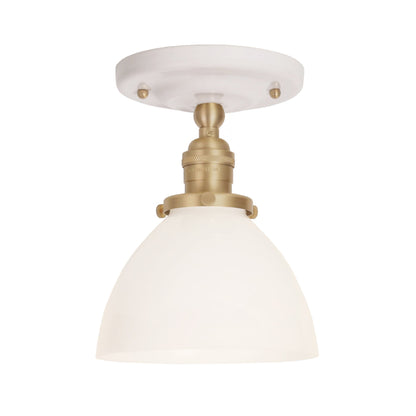 Grace Surface shown in Brass with a Gloss White Ceramic canopy and Opal Glass shade