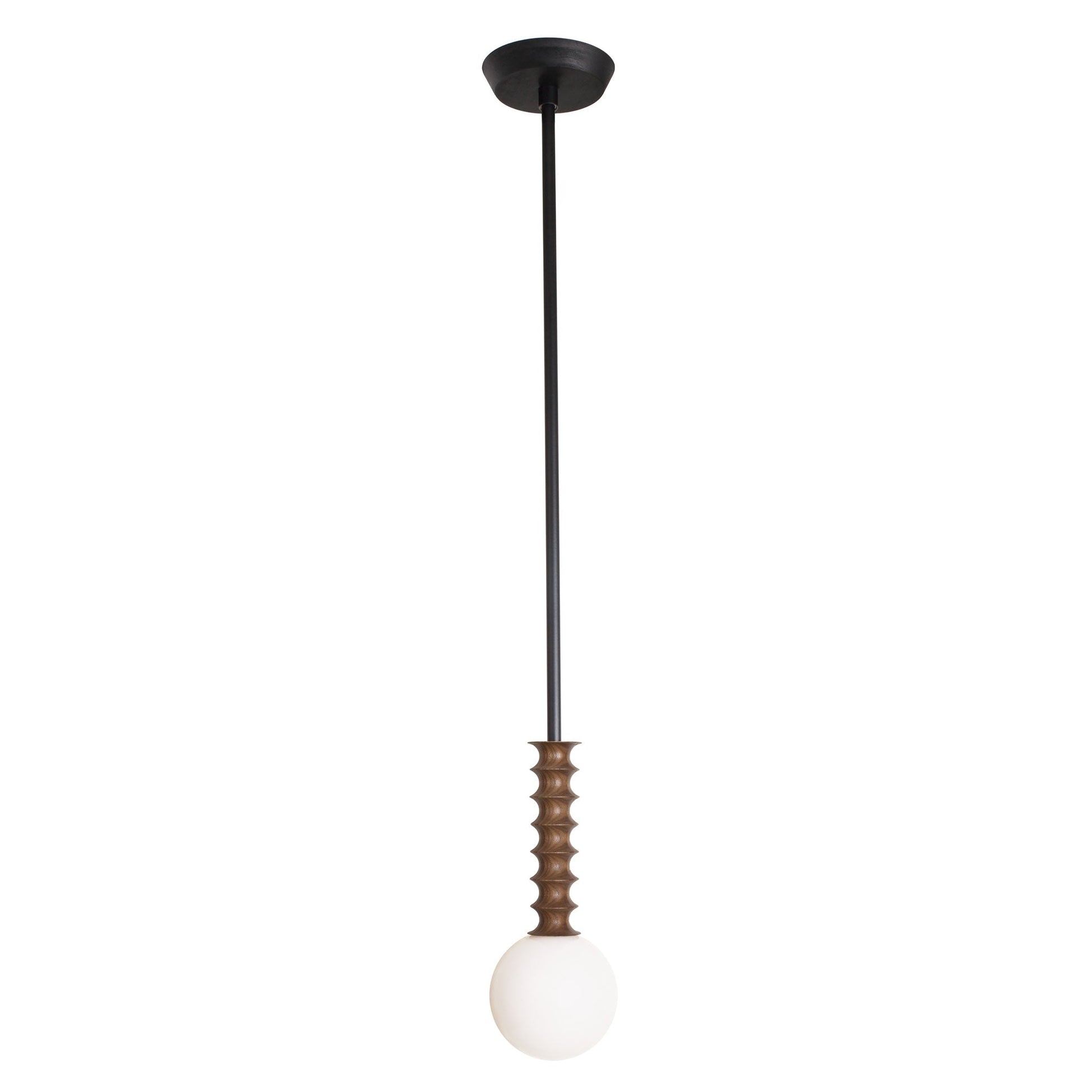 Joslyn Pendant shown in Walnut with Matte Black and a Black Stained canopy.