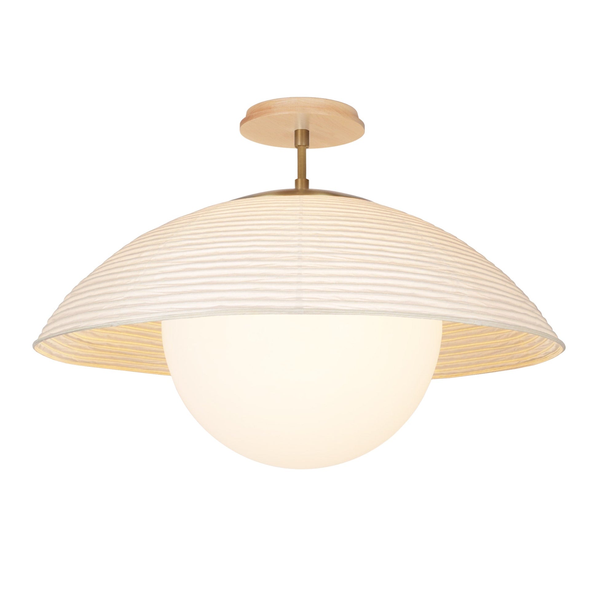 Maru Surface with a Natural shade shown in Heirloom Brass with a Maple Wood canopy