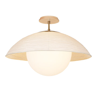 Maru Surface with a Natural shade shown in Heirloom Brass with a Maple Wood canopy