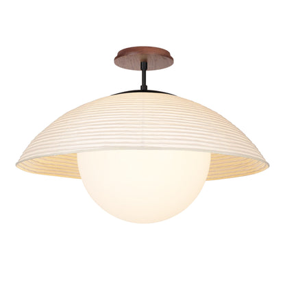 Maru Surface with a Natural shade shown in Matte Black with a Walnut Wood canopy