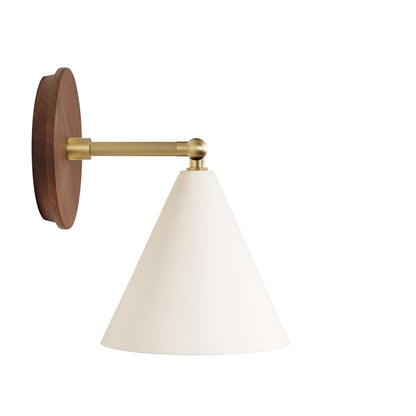 Petra Ceramic Sconce shown in Brass with a 3" rod and Walnut Wood canopy