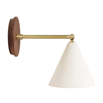Petra Ceramic Sconce shown in Brass with a 6" rod and Walnut Wood canopy