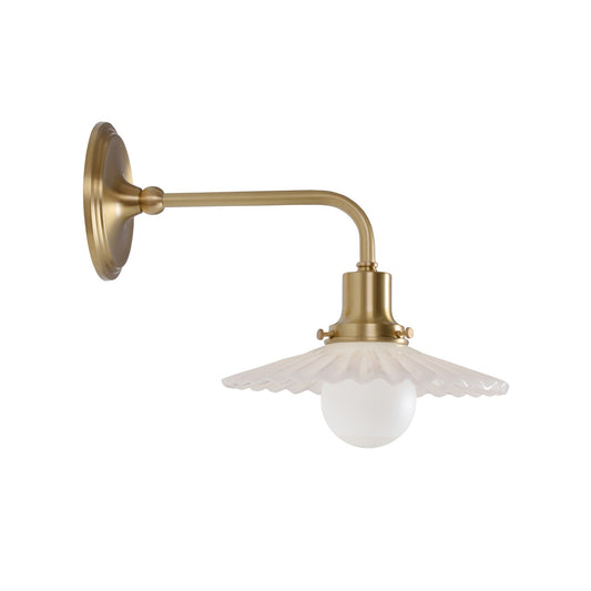 Marjorie Demi Sconce shown in Heirloom Brass.