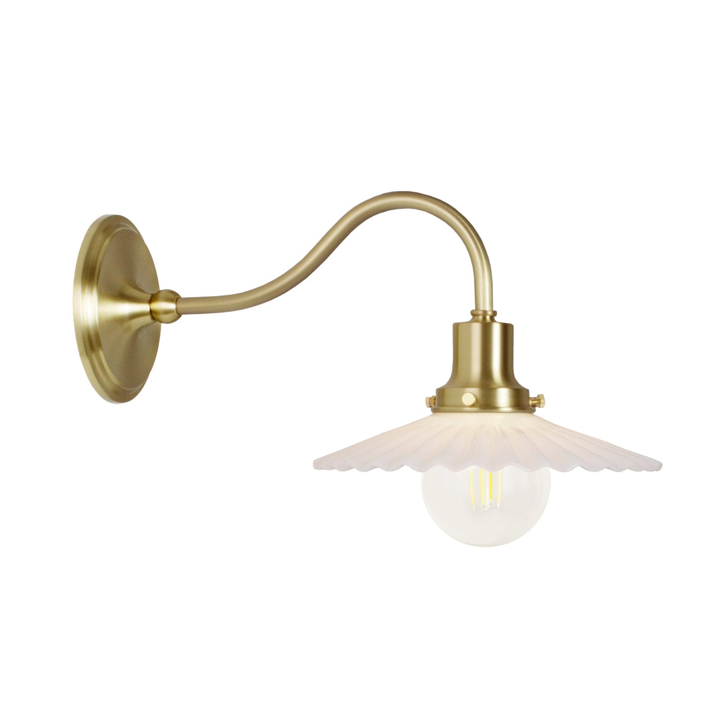 Marjorie Petite Sconce shown in Brass.